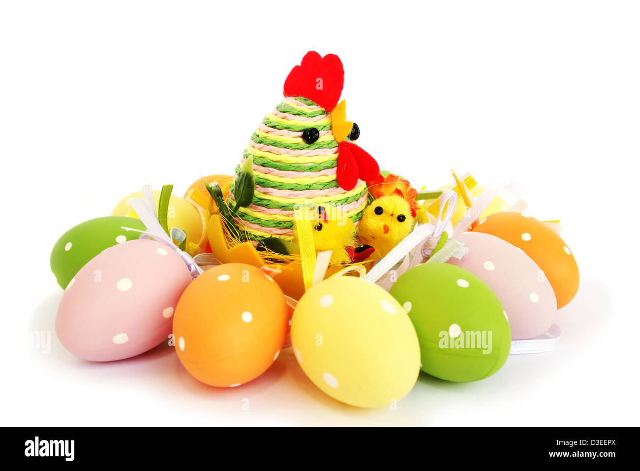 Easter eggs nest isolated on white background Stock Photo - Alamy