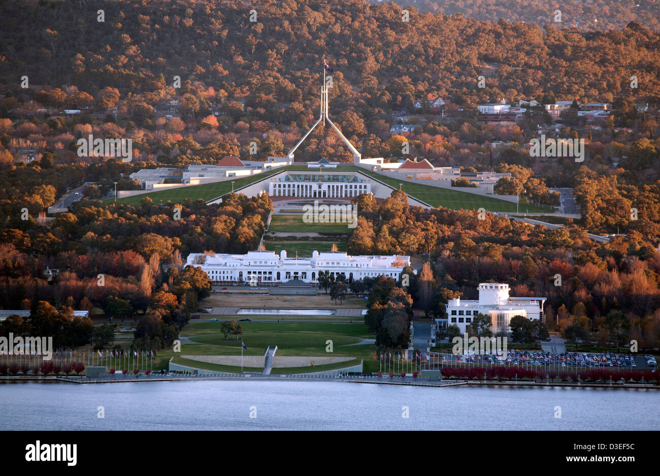 Autumn colours surround the Provisional Parliament House and Parliament House Capital Hill Canberra Australia Stock Photo