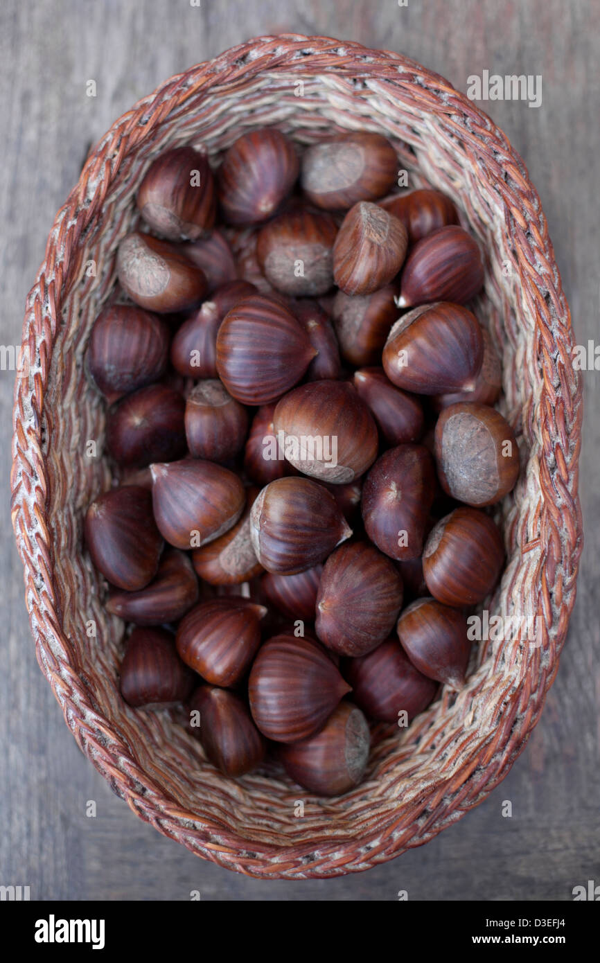 Basket full of frish chestnuts. Stock Photo
