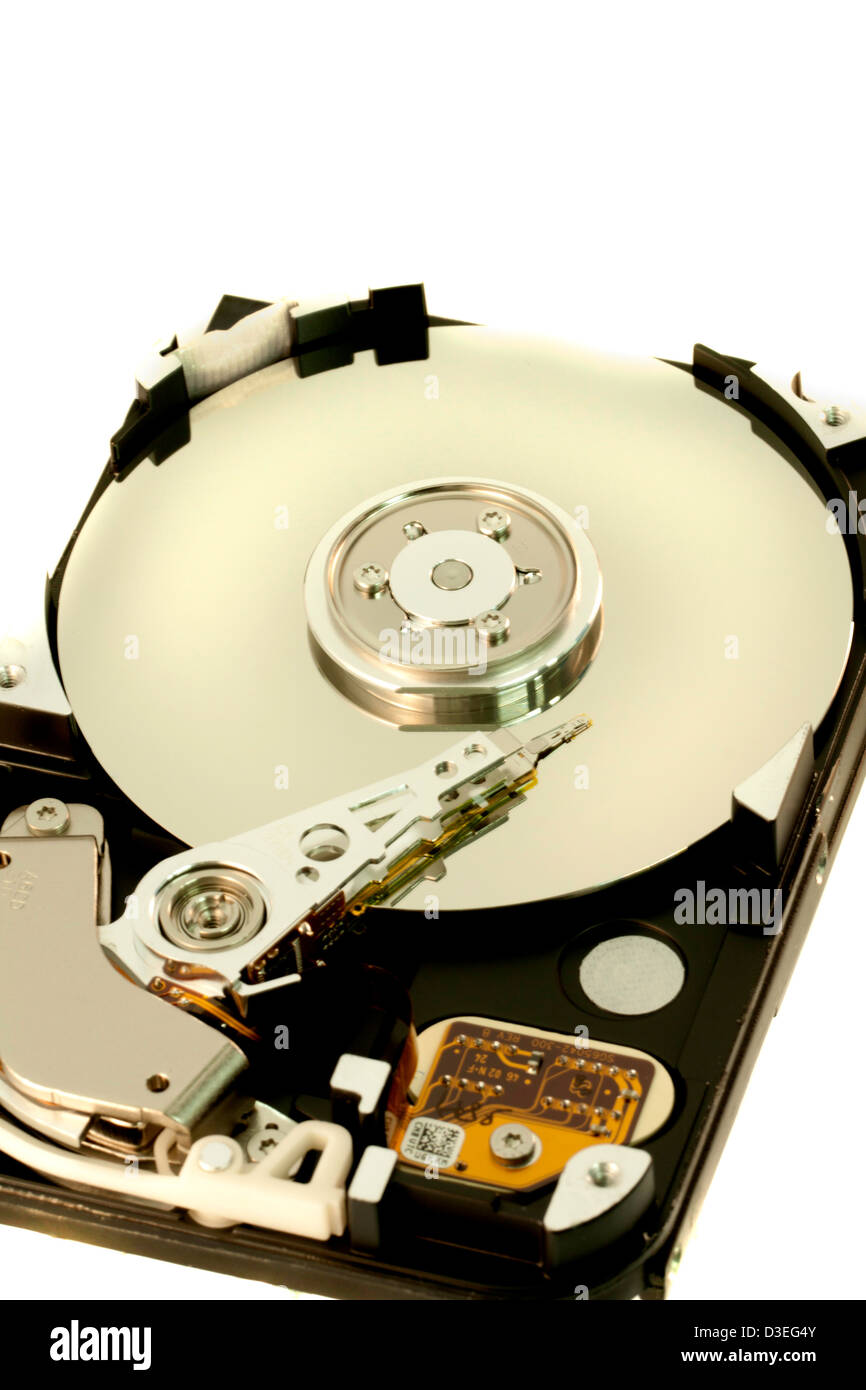 close view detail of the inside of a computer harddisk isolated on a ...