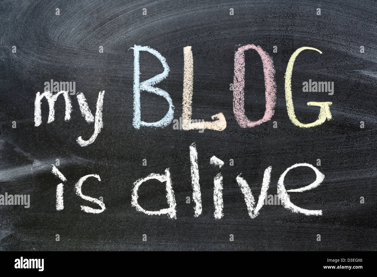 my blog is alive phrase handwritten on school blackboard Stock Photo