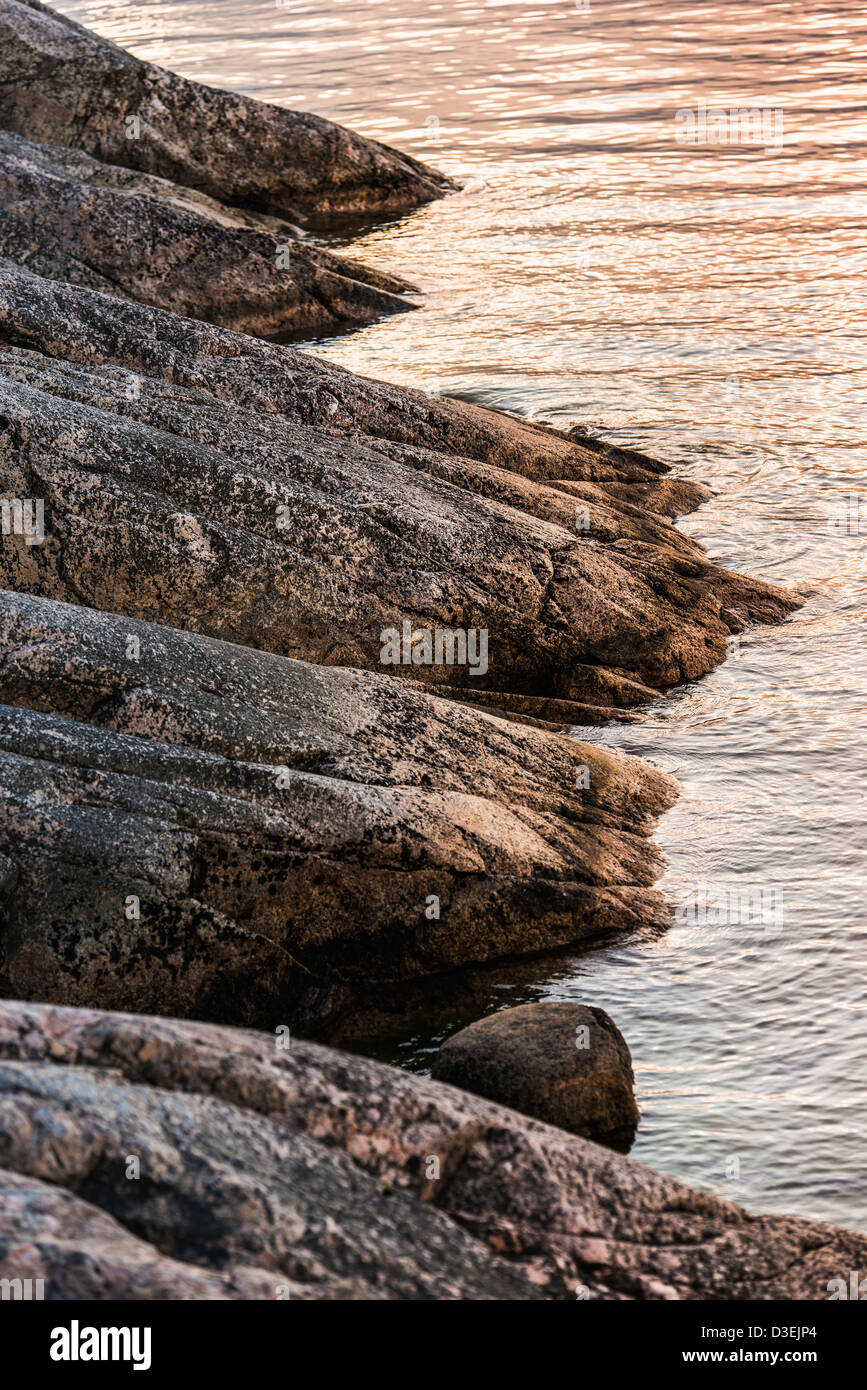 Tranquil evening scene of rocks and water in the Stockholm archipelago, Sweden Stock Photo