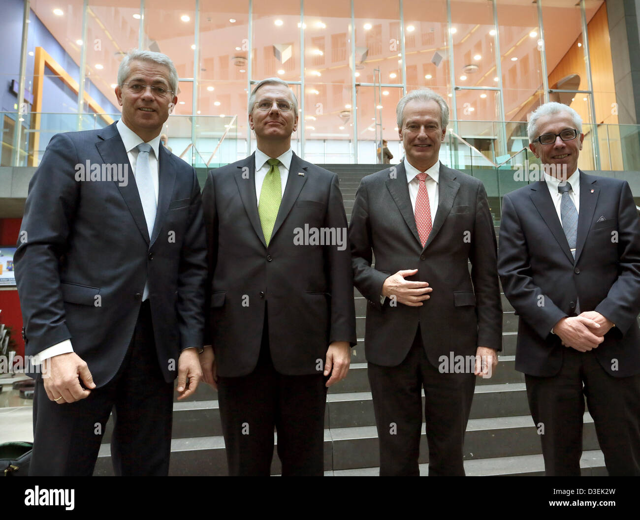 CEO of Fraport AG Stefan Schulte (L-R), CEO of Lufthansa Christoph Franz, President of the Federal Association of German Aviation Industry e.V. Klaus-Peter Siegloch and CEO of Air Berlin Wolfgang Prock-Schauer pose for a group photo before the start of a joint press conference in Berlin, Germany, 18 February 2013. The guidelines for fairer competition in international air transport were presented. Photo: STEPHANIE PILICK Stock Photo