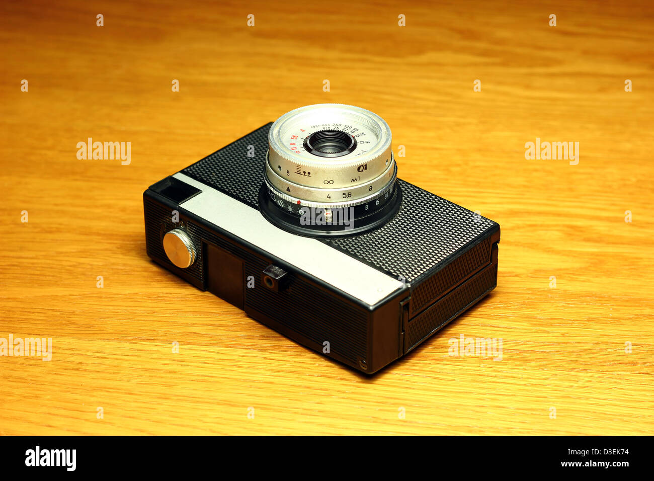 Old film camera on wooden background Stock Photo Alamy