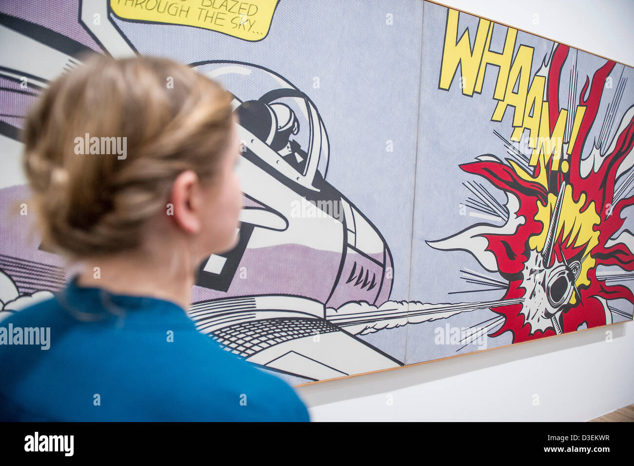 Tate Modern, London, UK. 18 February 2013. Whaam, inspired by a comic book. Roy Lichtenstein, one of the most famous figures in Pop Art, is exhibited at the Tate Modern. This is the first major retrospective of Lichtenstein’s work in twenty years and brings together over 100 of the artist's most iconic paintings. The show will run from 21 February to 27 May 2013 and is sponsored by Bank of America, Merrill Lynch. Tate Modern, London, UK 18 February 2013. Credit: Buy Bell/Alamy Live News Stock Photo