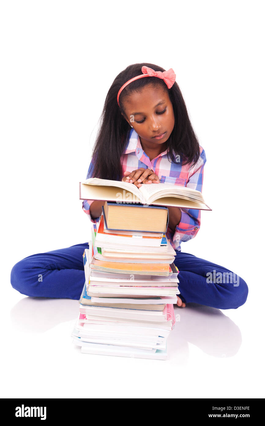 African little girl reading a book Cut Out Stock Images & Pictures - Alamy