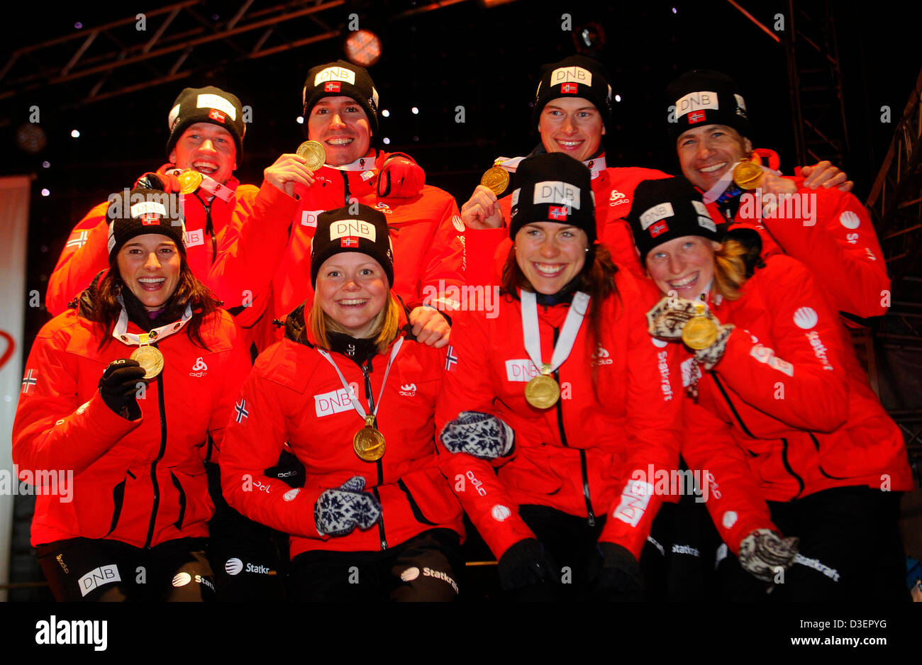 Top row from right: Ole Einar Bjorndalen, Henrik L'Abee-Lund, Emil Hegle Svendsen, Tarjei Bo and down from right Tora Berger, Synnove Solemdal, Hilde Fenne, Ann Kristin Aafedt Flatland of Norway are seen with gold medal after the men´s and women´s relay race at the Biathlon World Championships in Nove Mesto na Morave, Czech Republic, Friday, Feb. 16, 2013. (CTK Photo/Lubos Pavlicek) Stock Photo