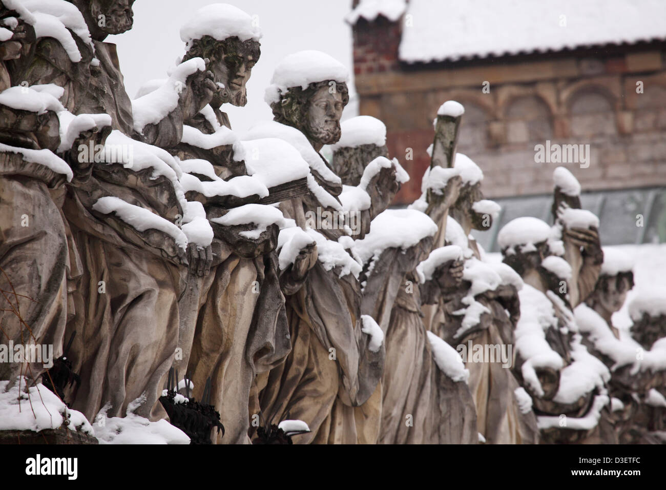 Snow on statues of the 12 disciples at the Church of Saints Peter and Paul in Krakow, Poland. Stock Photo