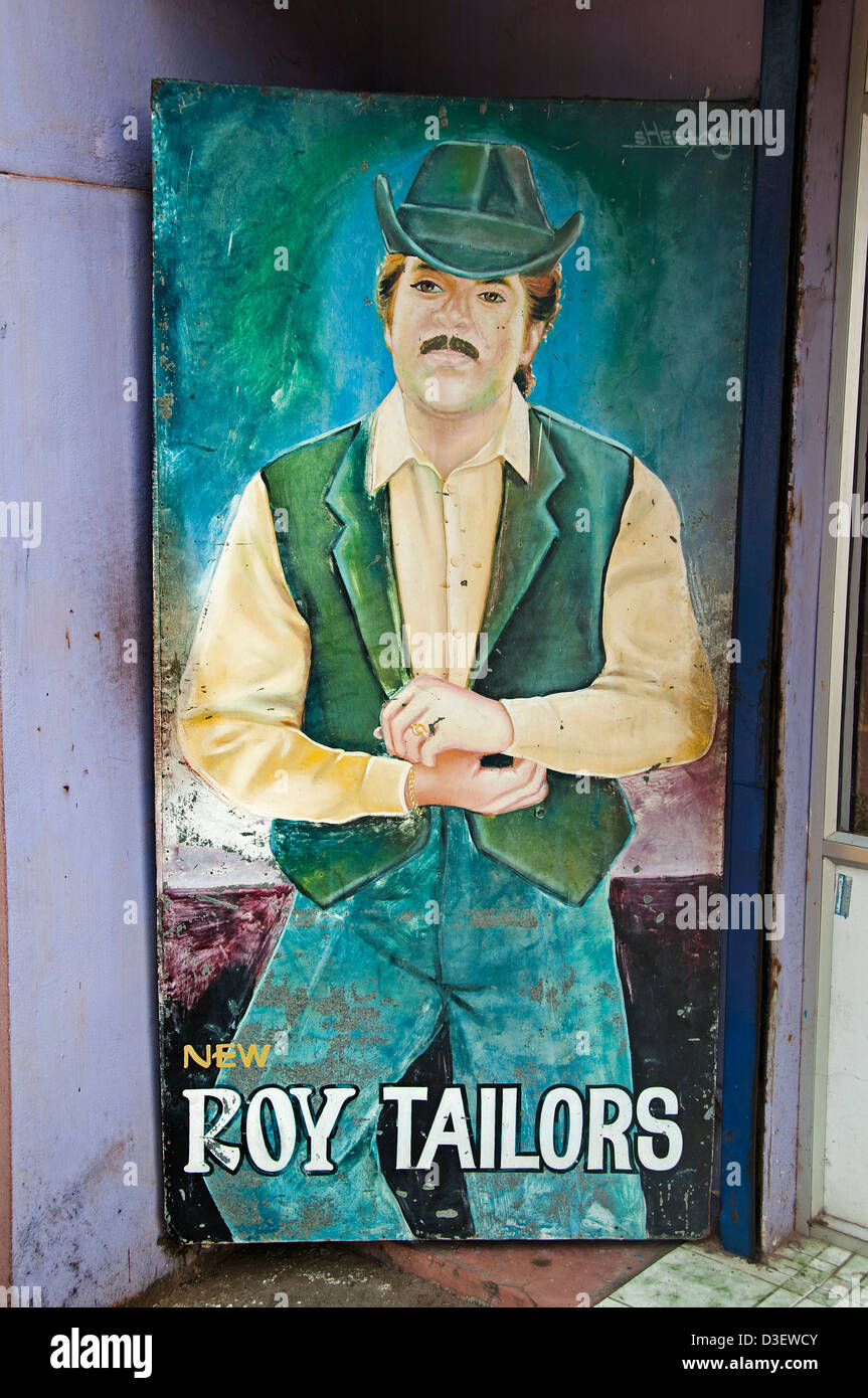 Tailor garment cowboy tailors billboard old India Stock Photo