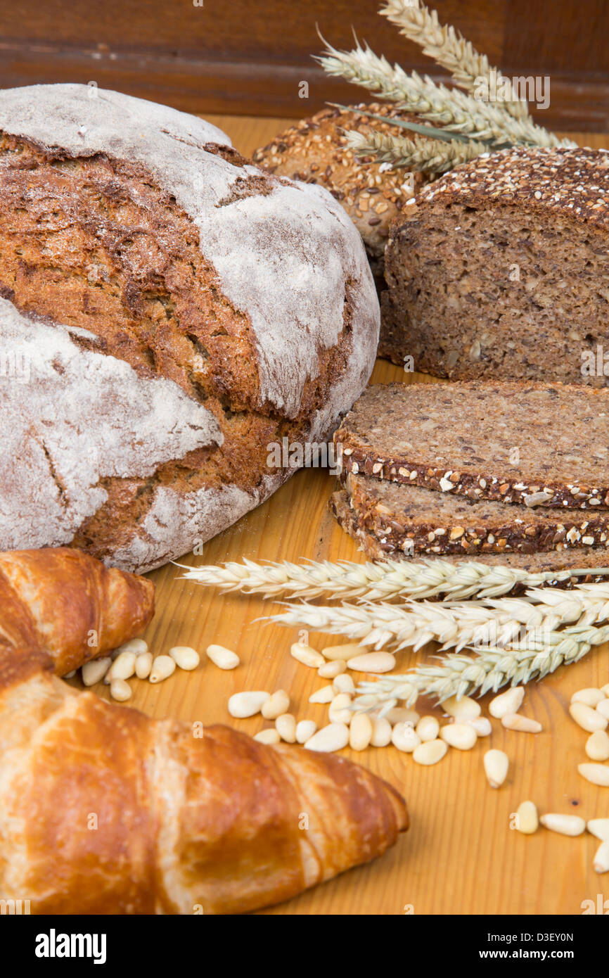Different types of bakery products such a a loarf of bread, pretzel