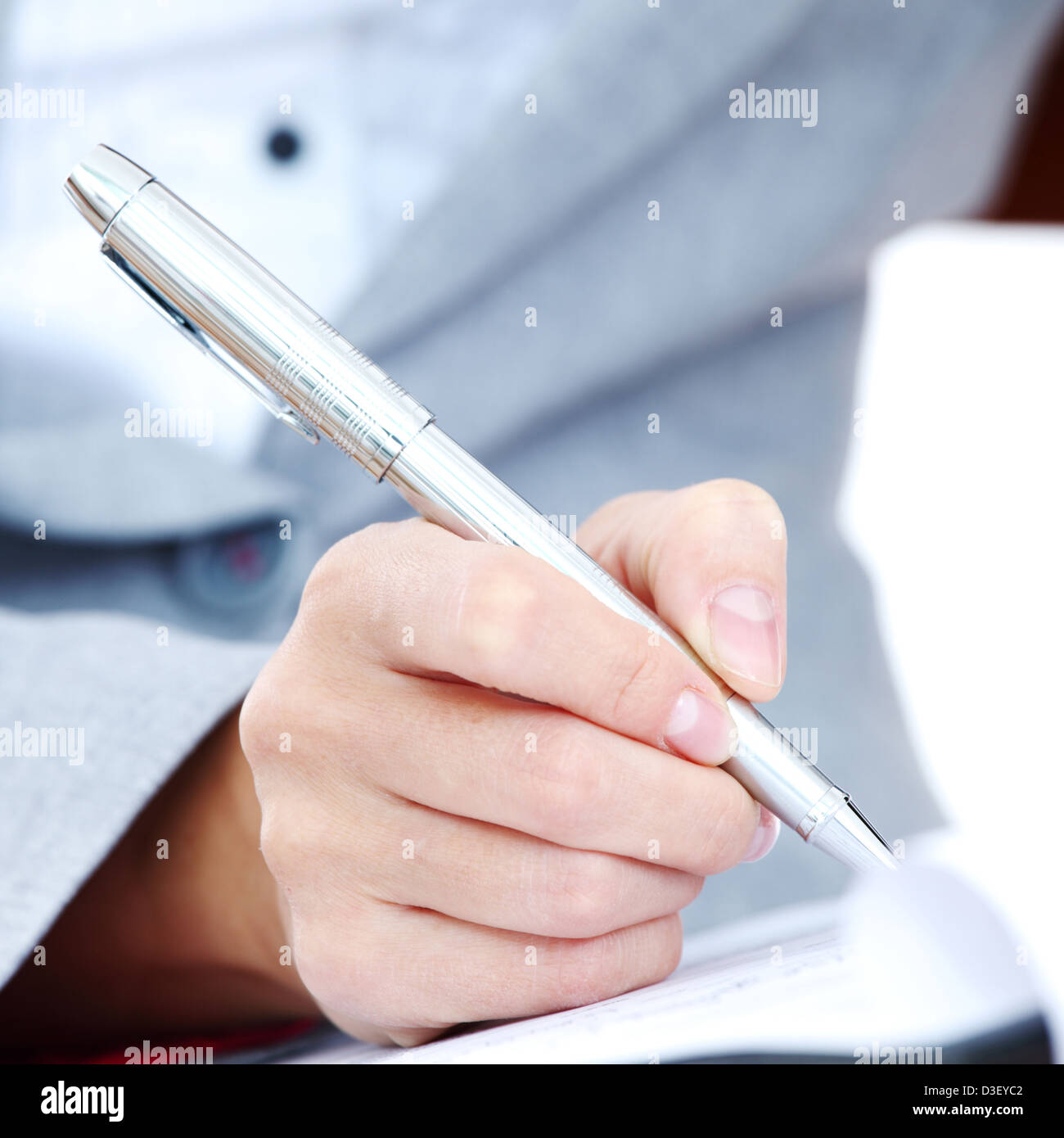 woman write by pen on paper Stock Photo - Alamy