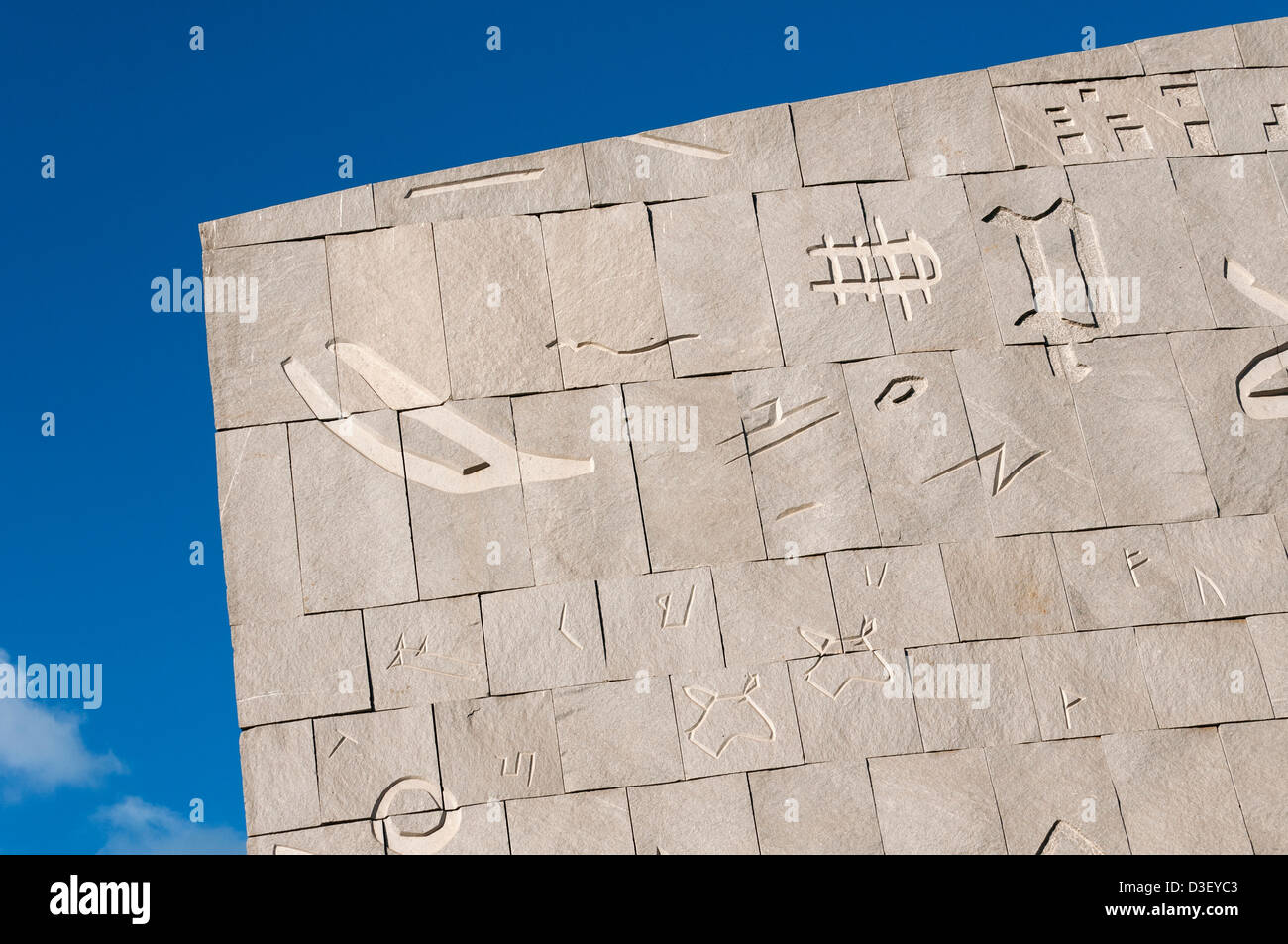 Close-up of Gray Granite Facade Carved with Various Scripts, Bibliotheca Alexandrina (Library of Alexandria), Egypt Stock Photo