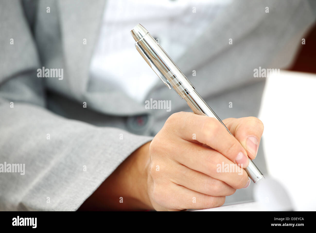 woman write by pen on paper Stock Photo - Alamy
