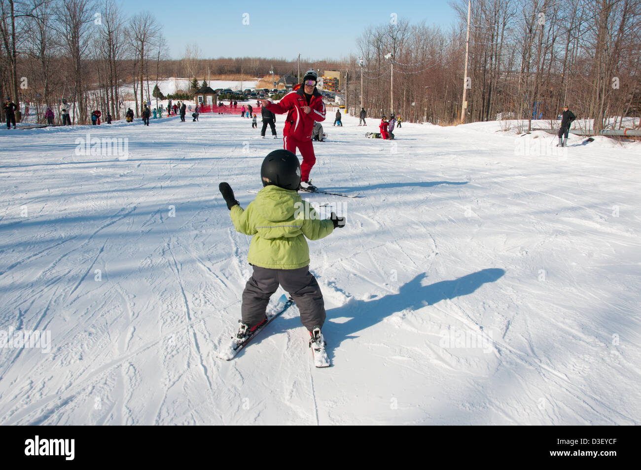 First Ski lesson of Alix, a three years old from Montreal who came with his parents for his