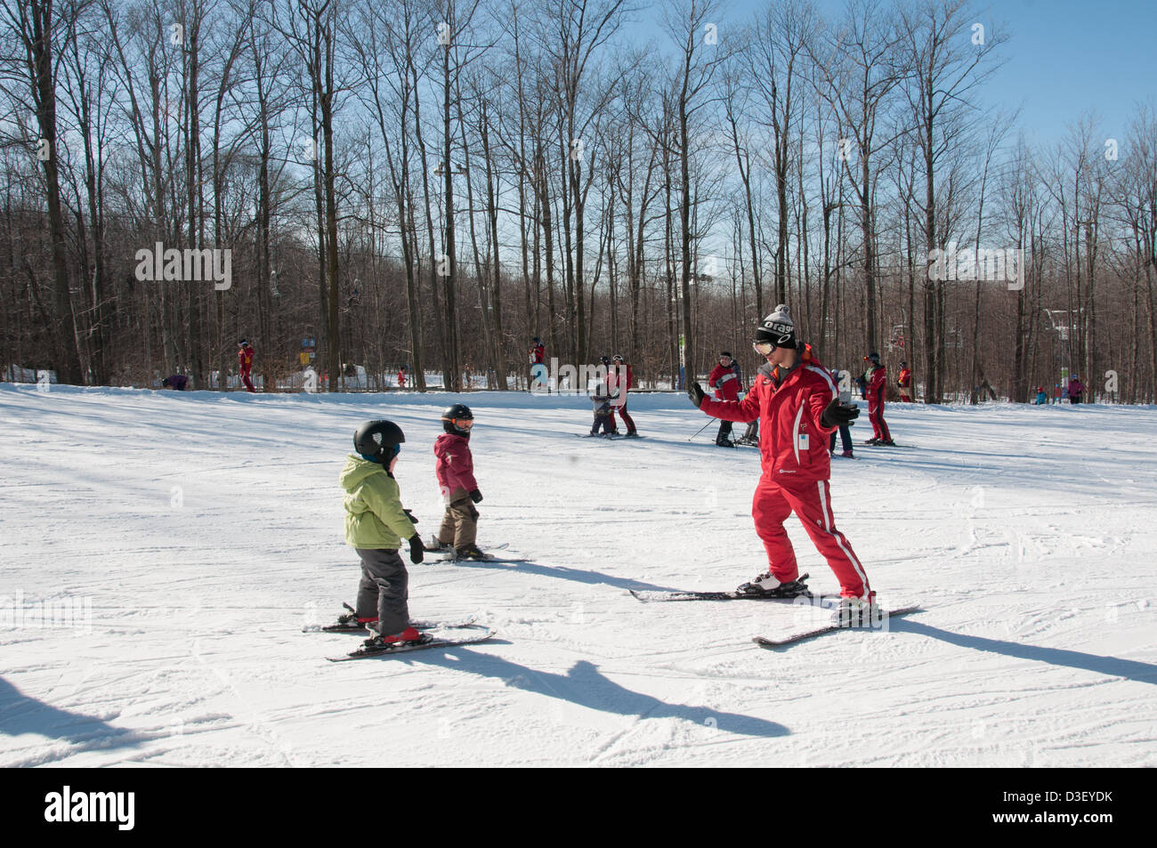 First Ski lesson of  children from Montreal who came with his parents for his first  private ski lesson The Ski Saint Bruno station open since 1965 has had 500 000 students graduating from its ski school. Stock Photo