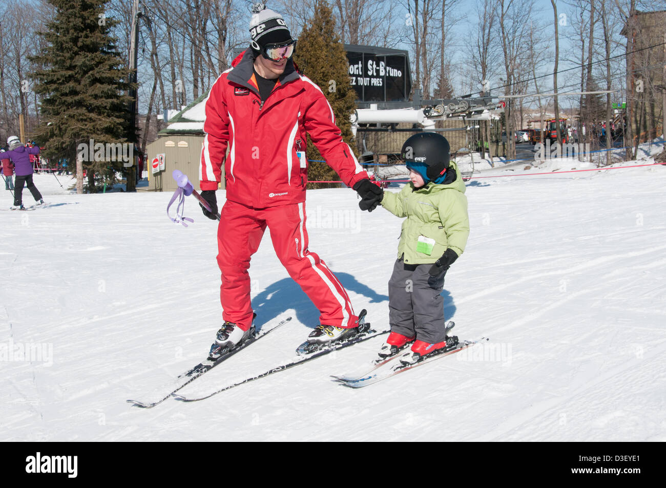 First Ski lesson of a three years old from Montreal who came with his parents for his first