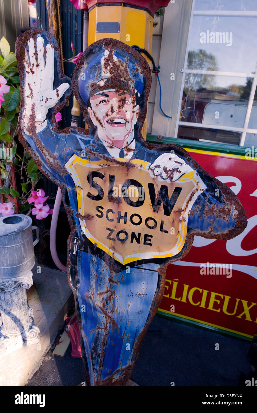 Rusty 1950's Coca-Cola policeman tin crossing guard. Stock Photo