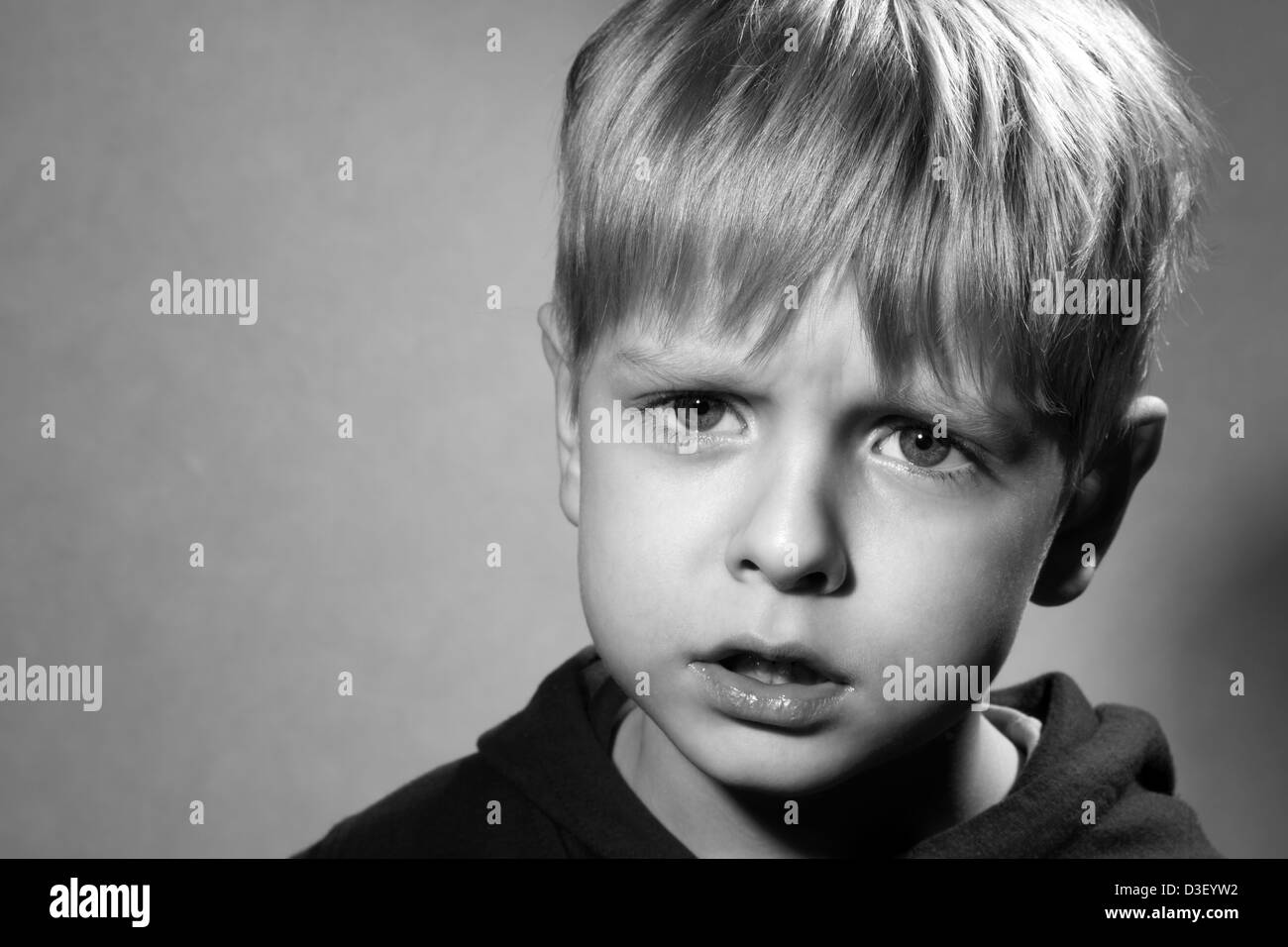 disgruntled little boy Stock Photo