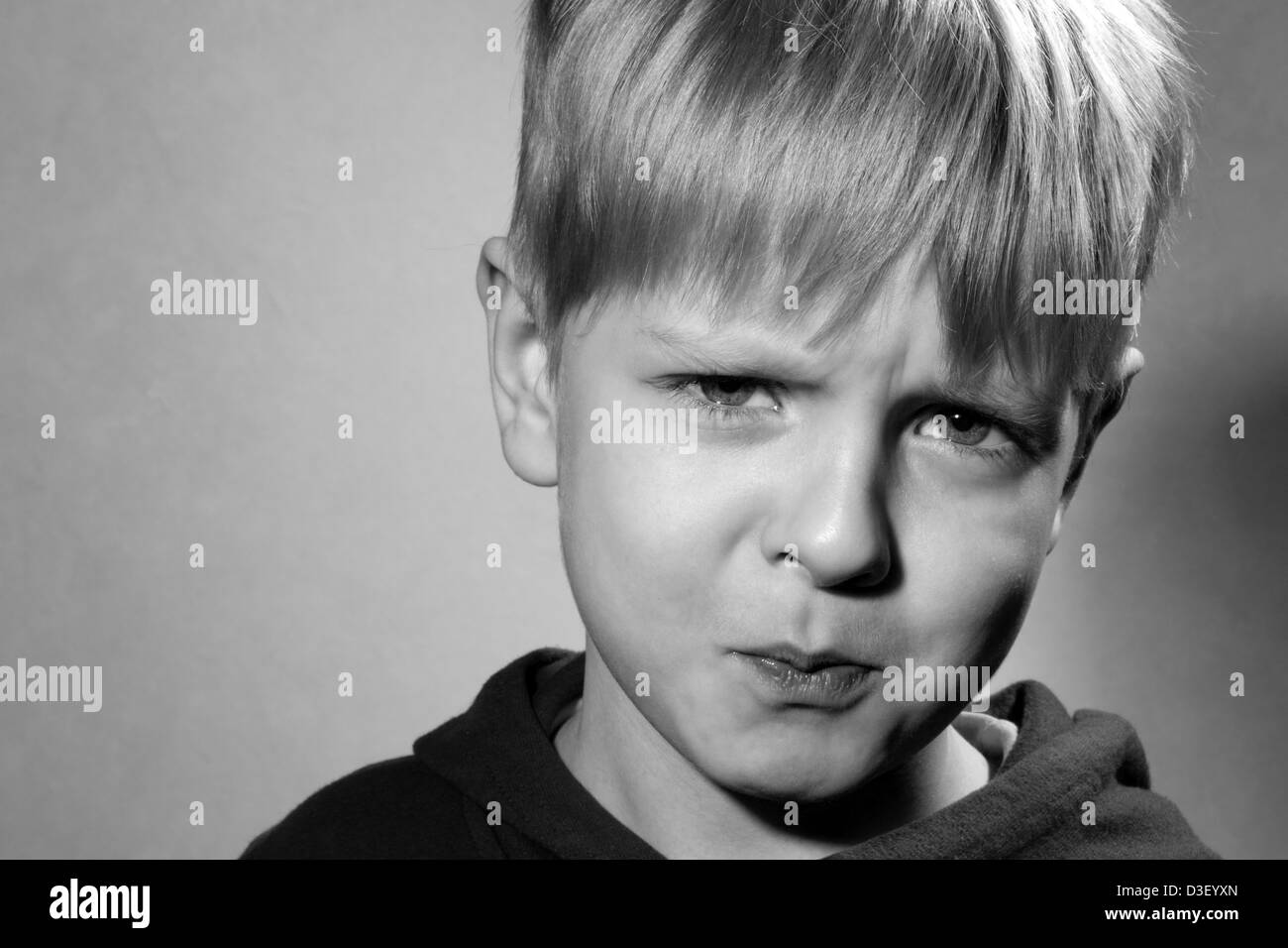 harmful little boy, black and white Stock Photo