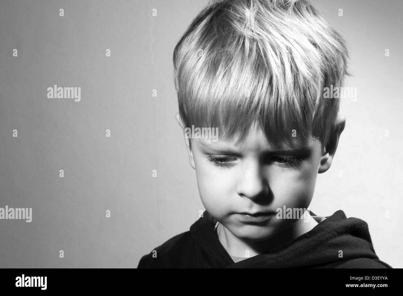 upset little boy, black and white Stock Photo