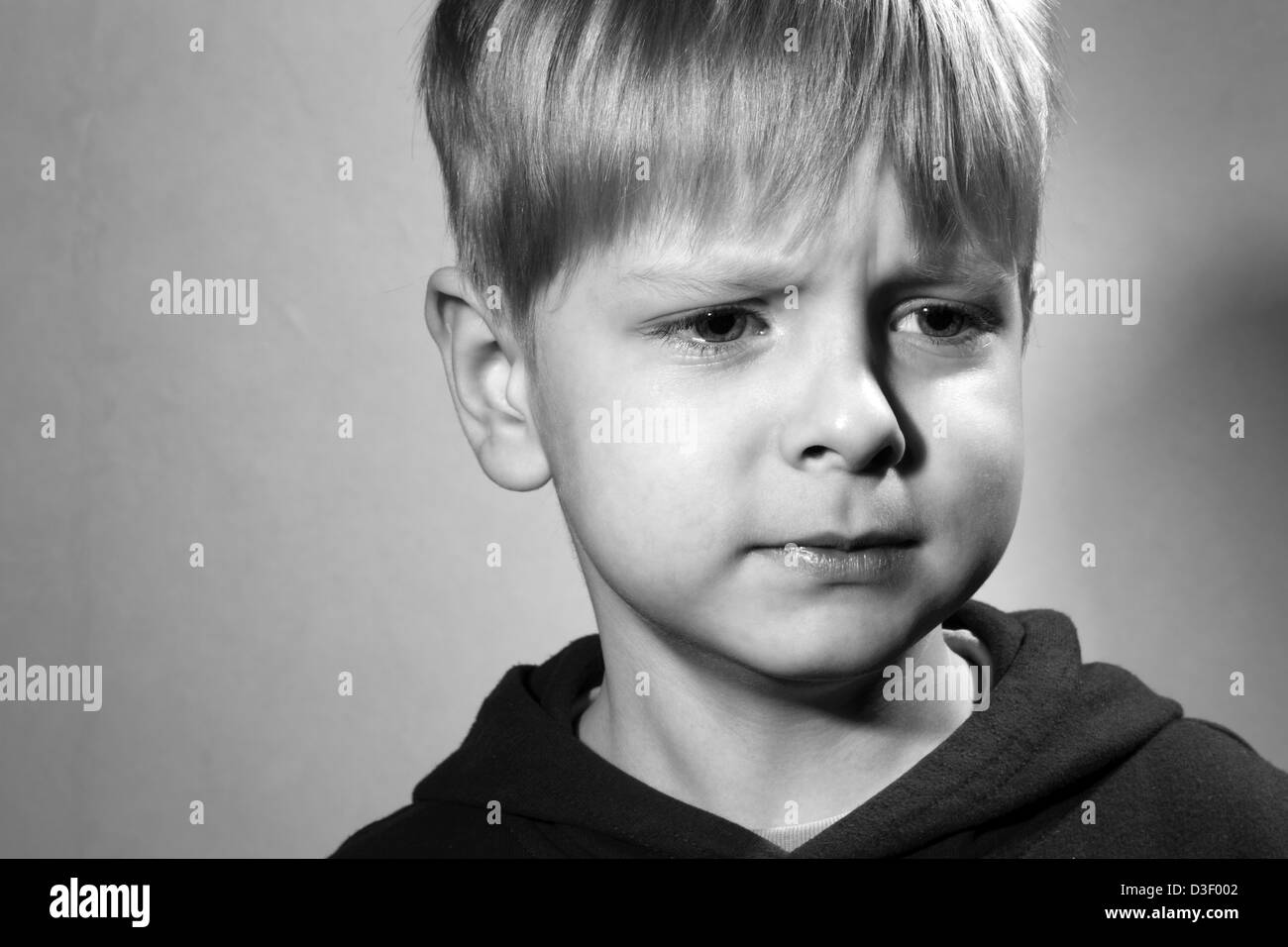 vexed little boy, black and white Stock Photo