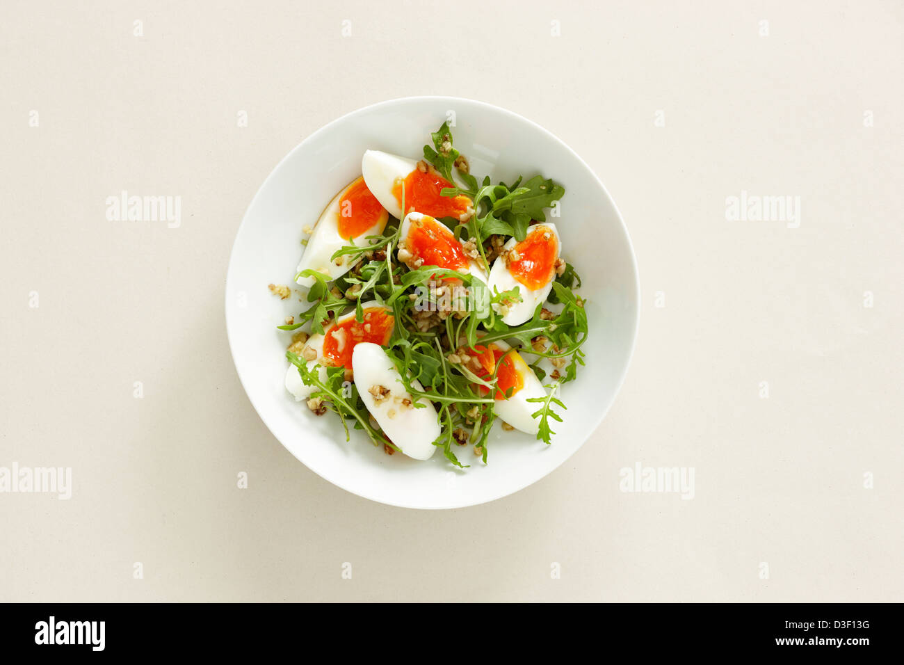 Boiled egg rocket walnut breakfast Stock Photo