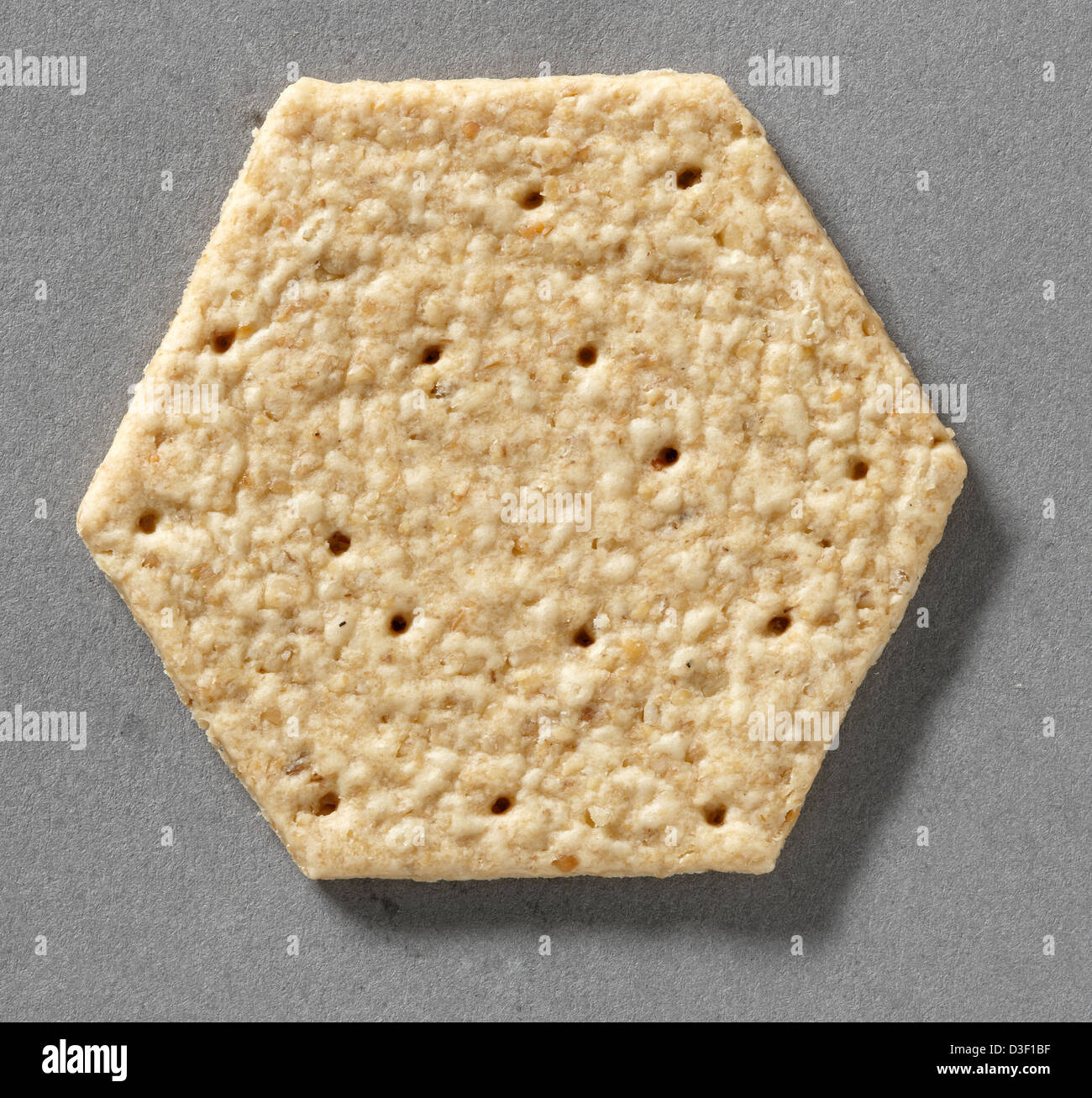 Hexagonal baked savory biscuit for cheese Stock Photo