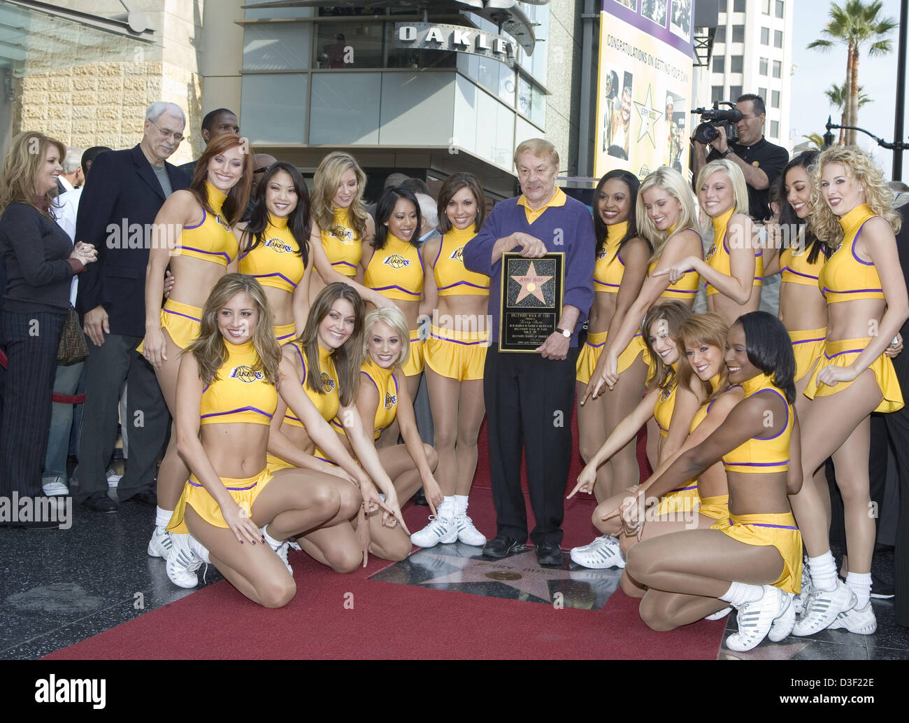 Oct. 30, 2006 - Hollywood, CALIFORNIA, USA - Lakers' owner Jerry Buss dies at 80..FILE PHOTO..Jerry Buss (C), owner of Los Angeles Lakers professional basketball team, holds a plaque as he poses with the Laker Girls cheerleaders after his star was unveiled on the Hollywood Walk of Fame October 30, 2006 in Hollywood, California..ARMANDO ARORIZO/PI. (Credit Image: © Armando Arorizo/Prensa Internacional/ZUMAPRESS.com) Stock Photo