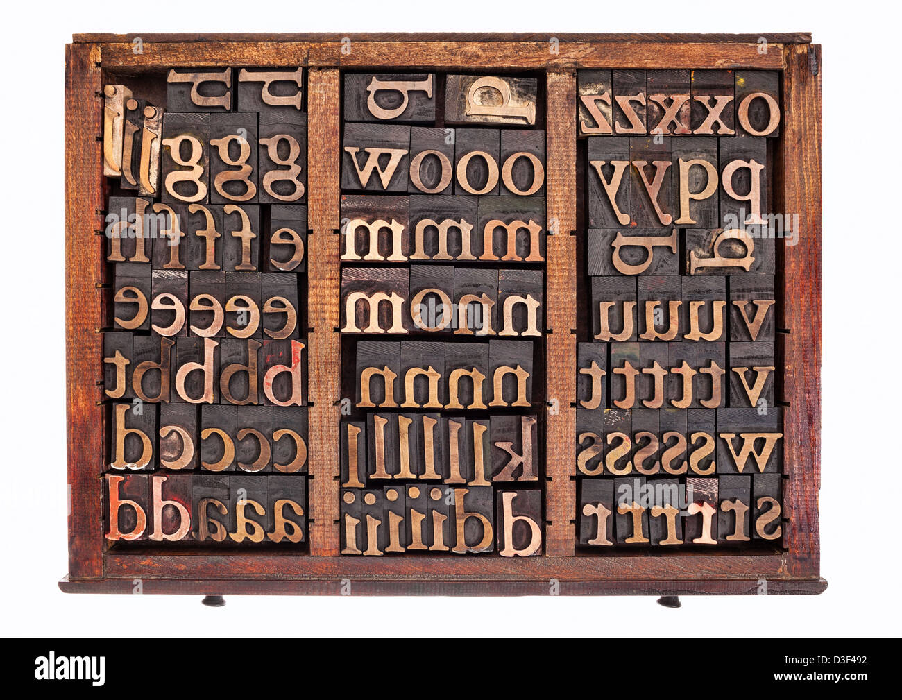 letterpress wood type printing blocks in old typesetter drawer isolated