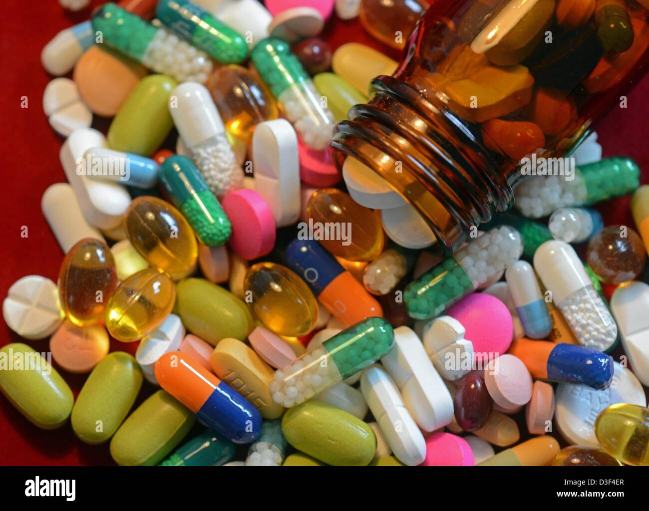 The illustraion show a pile of pills and tablets on display on a table in Dresden, Germany, 8 February 2013. Photo: Matthias Hiekel Stock Photo