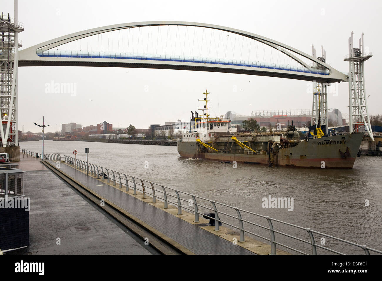 Salford Quays Millennium footbridge Raised Whilst the Manchester Ship Canal is Dredged Stock Photo