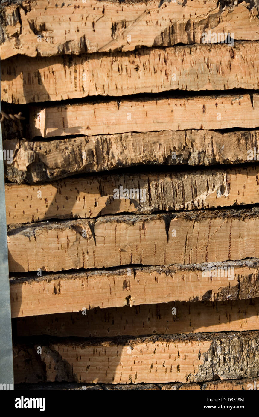 View of a pile of cork bark removed from the tree. Stock Photo