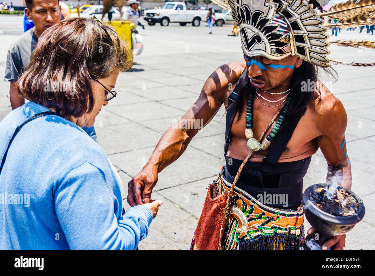 Aztec shaman doing a "limpia" (cleansing), Zocalo Square, Mexico DF