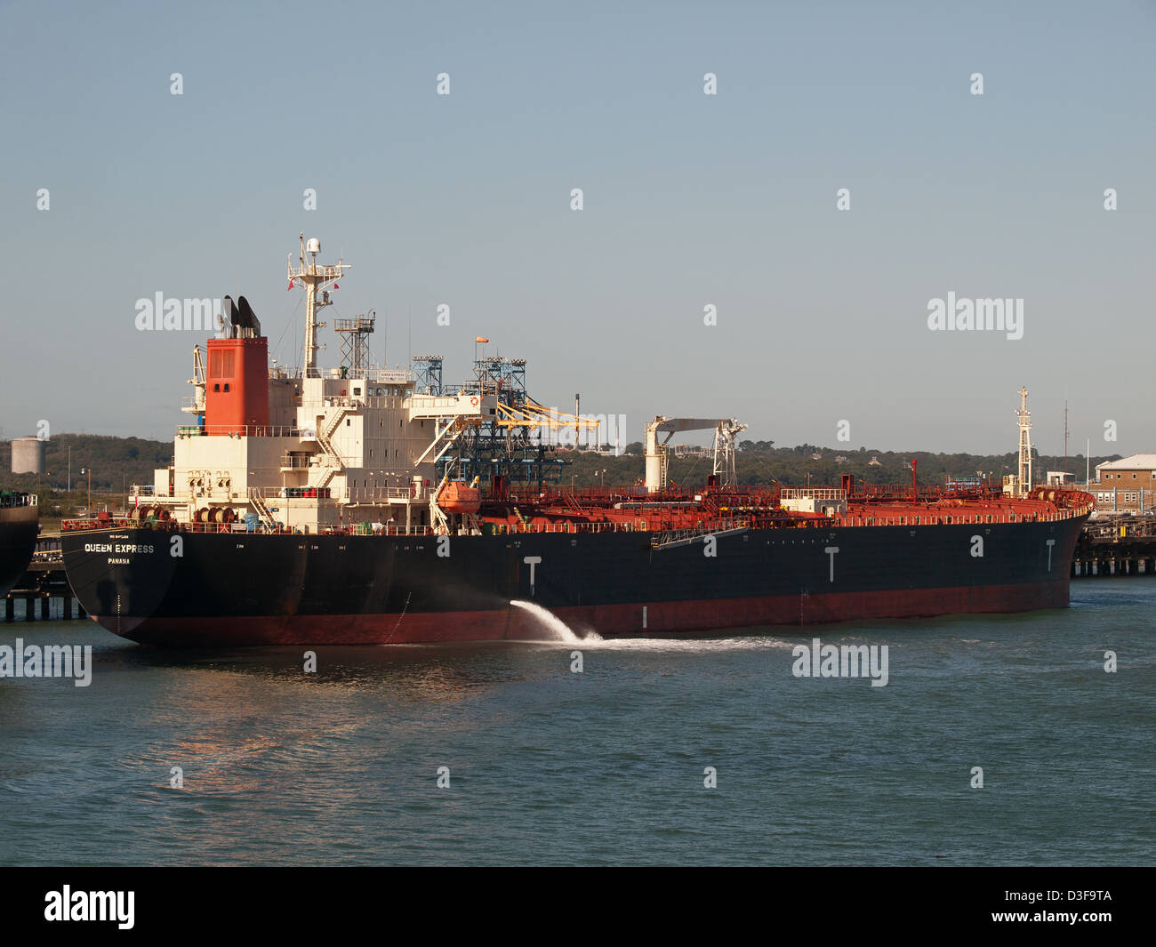 Oil tanker Queen Express berthed at the Esso Fawley oil refinery Hampshire England UK Stock Photo