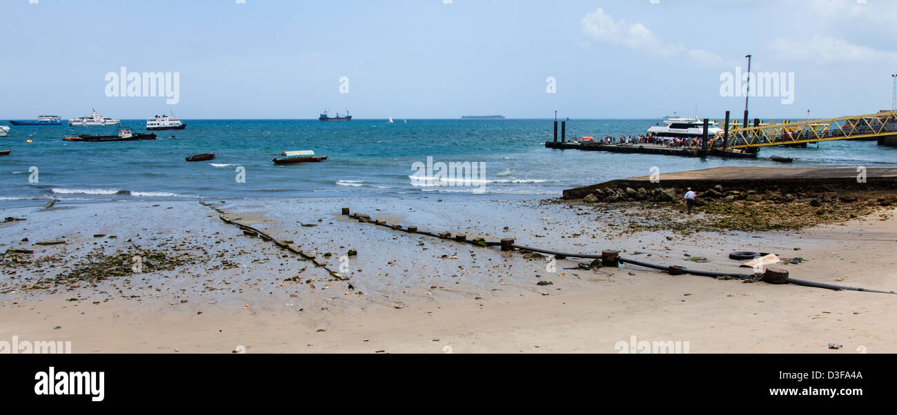 The view of the sea and ships at anchor from Stonetown Harbor. Zanzibar, Tanzania Stock Photo