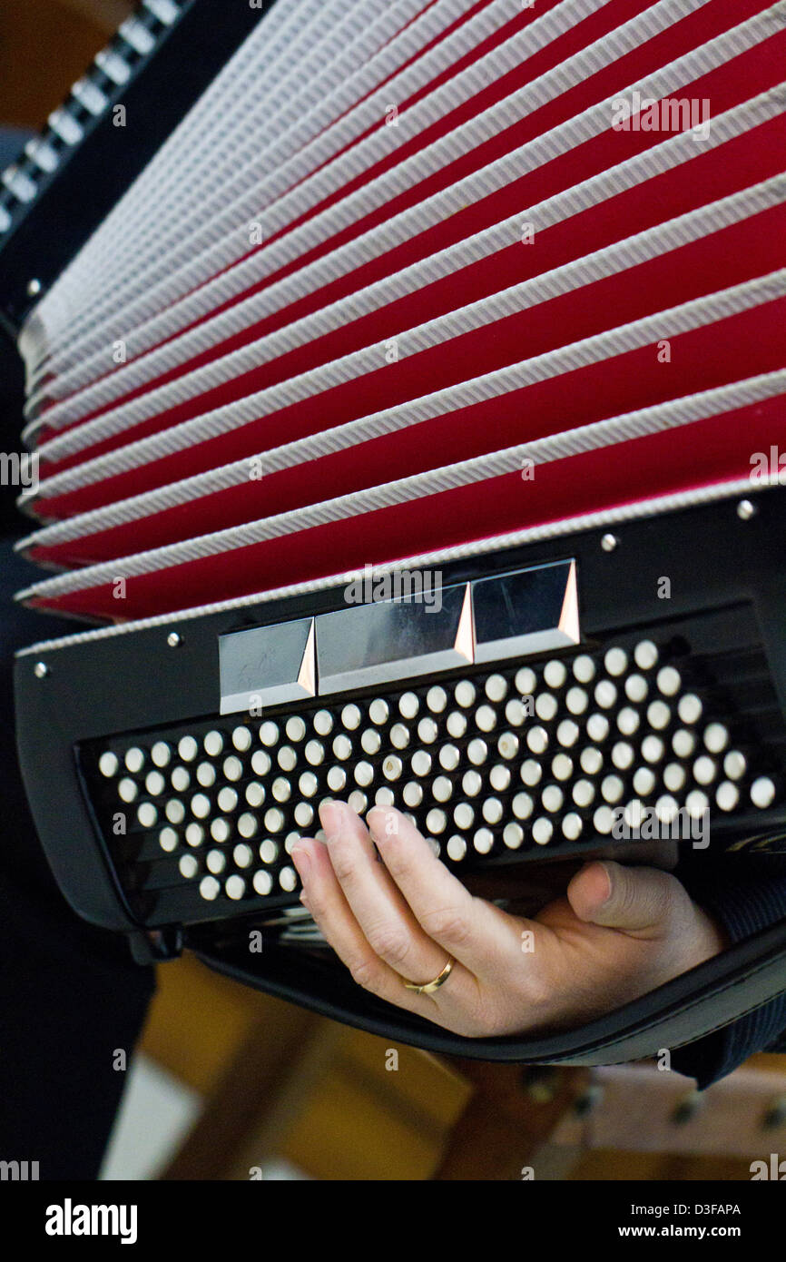Close up of hand playing accordion hi-res stock photography and images ...