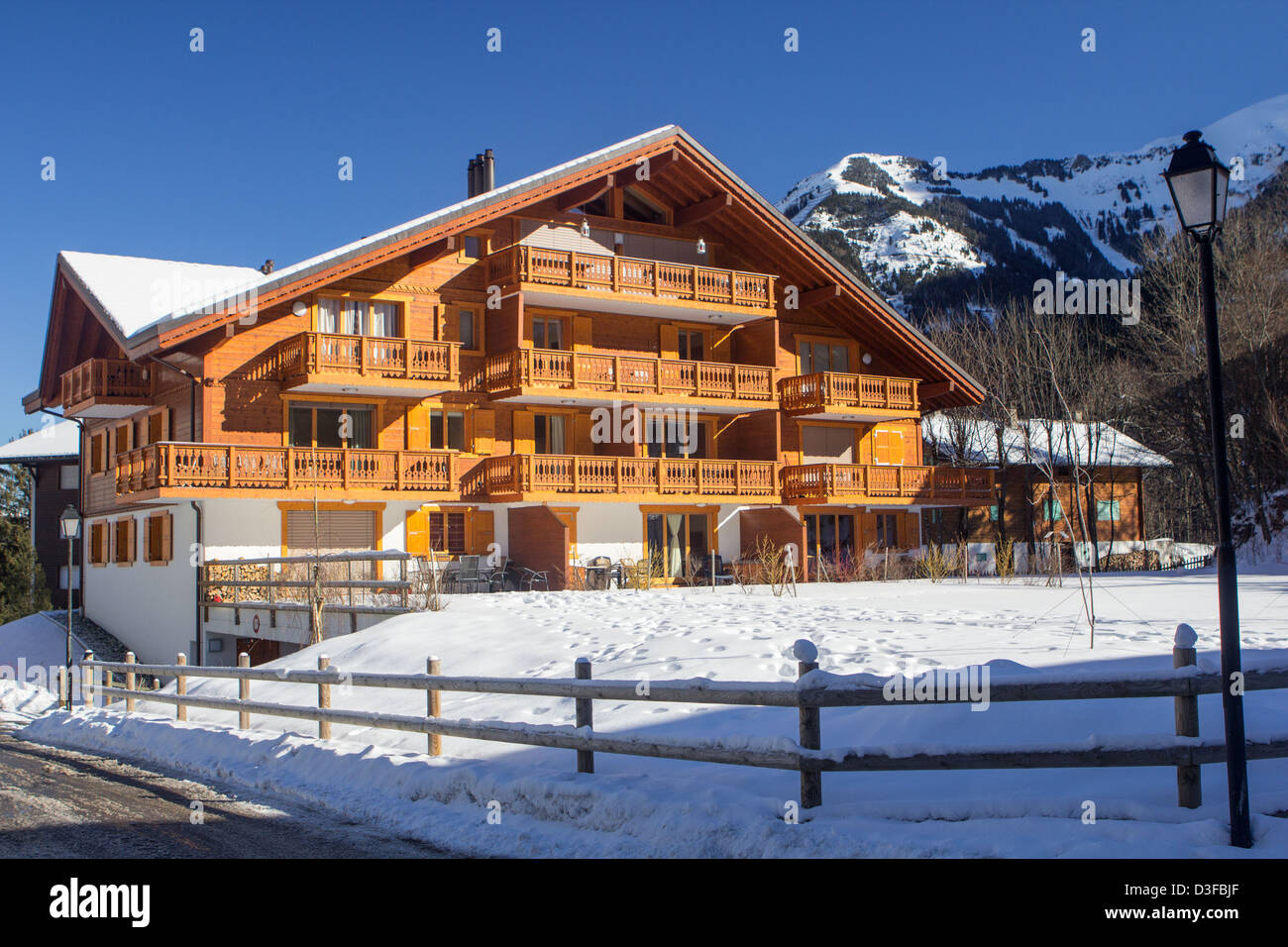 Swiss ski chalet in Winter Stock Photo Alamy