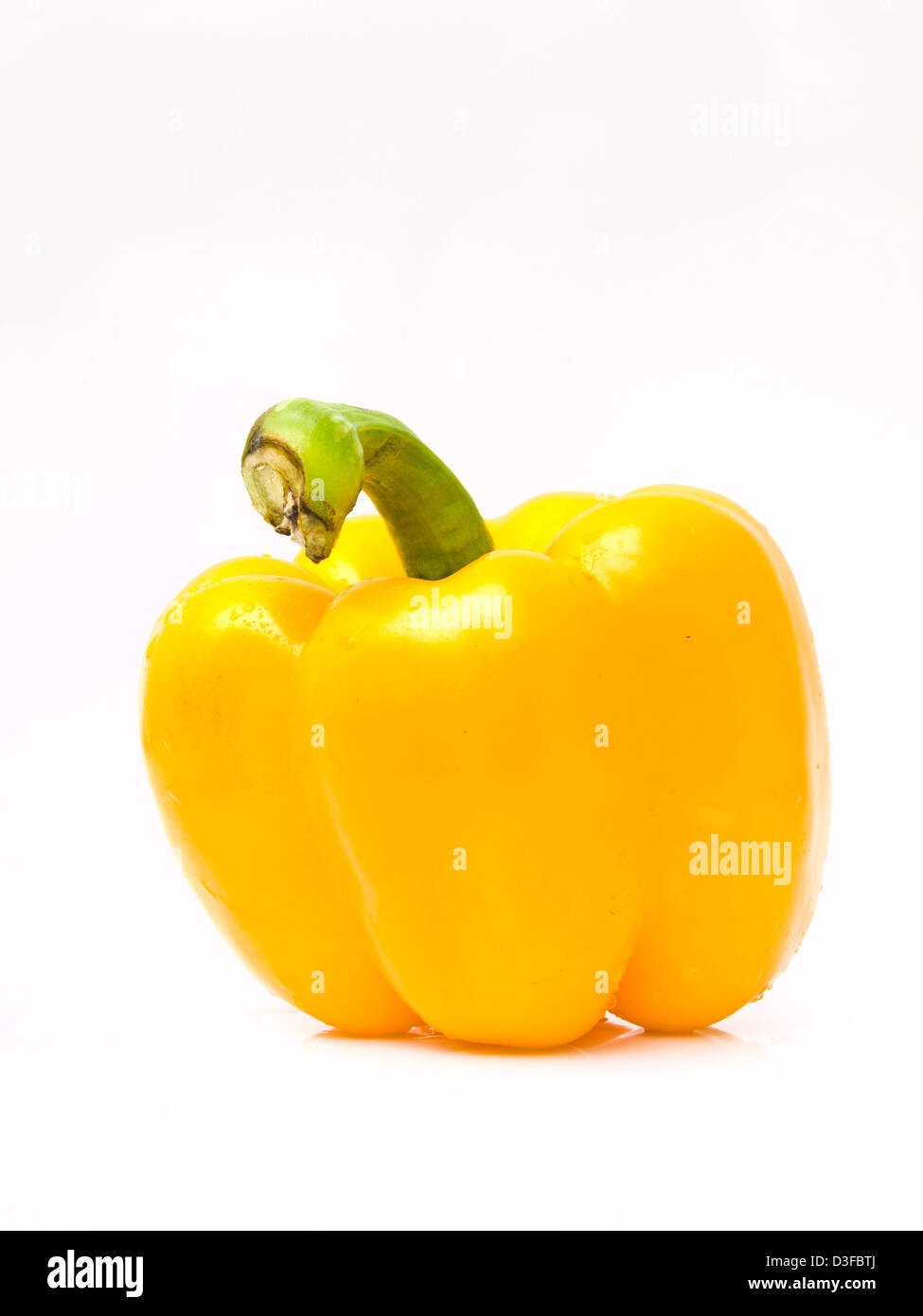 Fresh yellow bell pepper, Capsicum annuum, isolated on white background