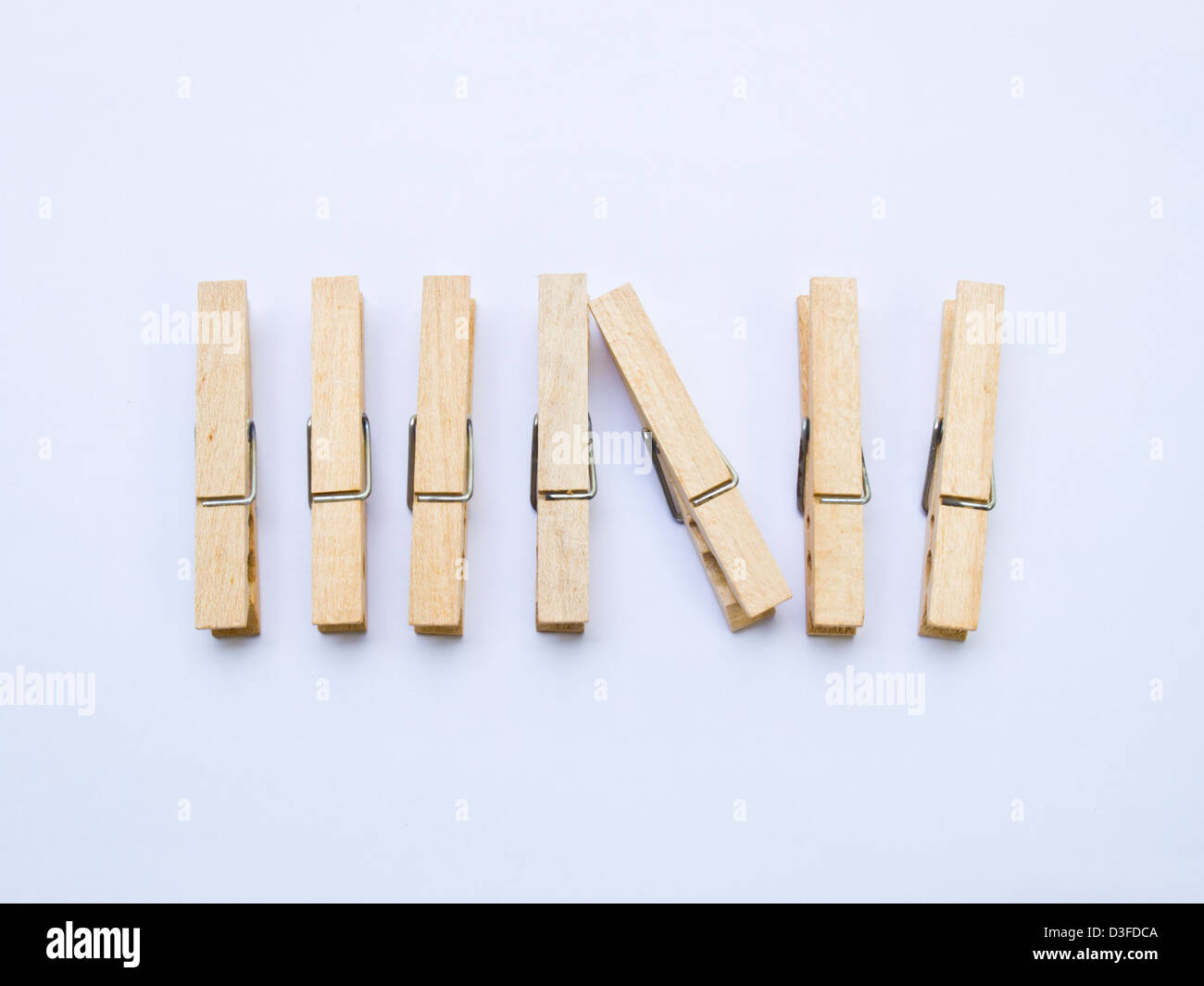 Wooden clothes clips isolated on white back ground Stock Photo Alamy