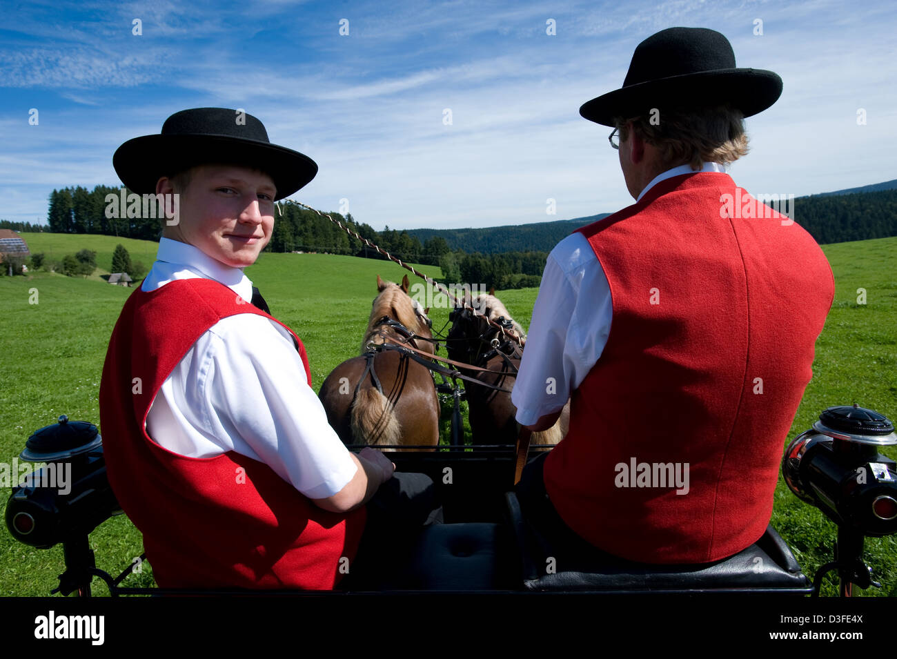 St. Märgen, Germany, father and son on a horsedrawn cart on