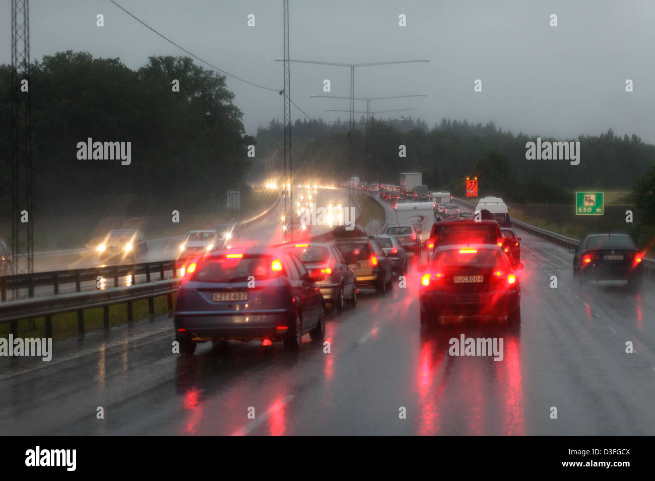 Stockholm, Sweden, rain and traffic jam on the highway just before Stockholm Stock Photo