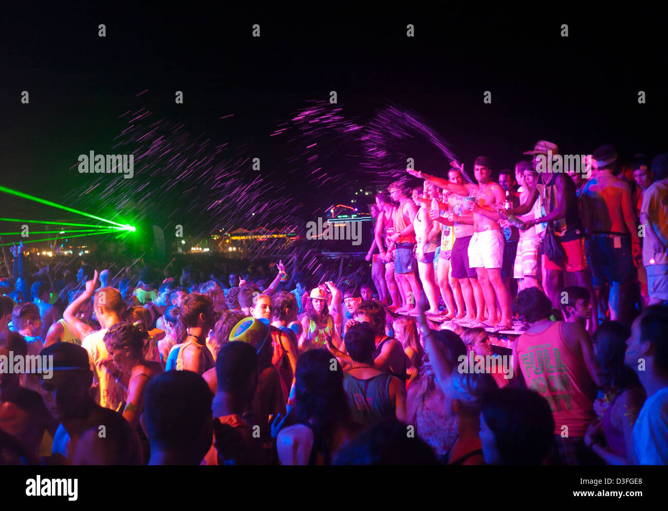 People dancing at the Full Moon Party on Haad Rin beach Koh Phangan Thailand Stock Photo