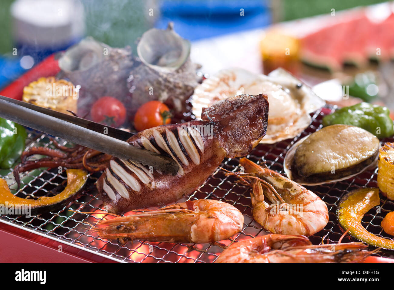 Seafood Grilled On Barbecue Grill Stock Photo - Alamy