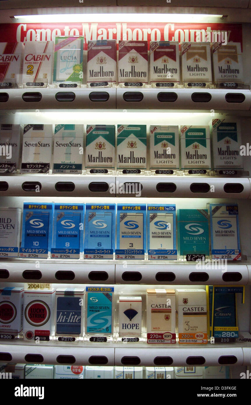 (dpa) - Packages of different cigarette brands are seen in a vending machine in Tokyo, Japan, 15 December 2004. Unlike the European packages the cigarettes in Japan do not have any health warning labels. Stock Photo