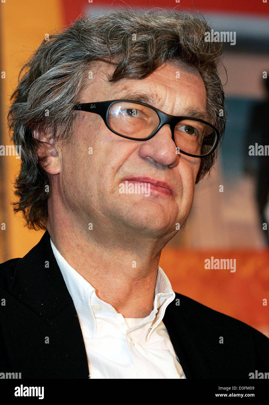 (dpa) - Famous German director Wim Wenders in a photograph taken during the 53rd International Filmfestival Mannheim-Heidelberg where he received the 'Master of Cinema-Award' for his lifetime achievements in Mannheim, Germany, 24 November 2004. Wenders' films include international acclaimed titles such as Paris; Texas, The Sky Over Berlin, Buena Vista Social Club and The Million Do Stock Photo