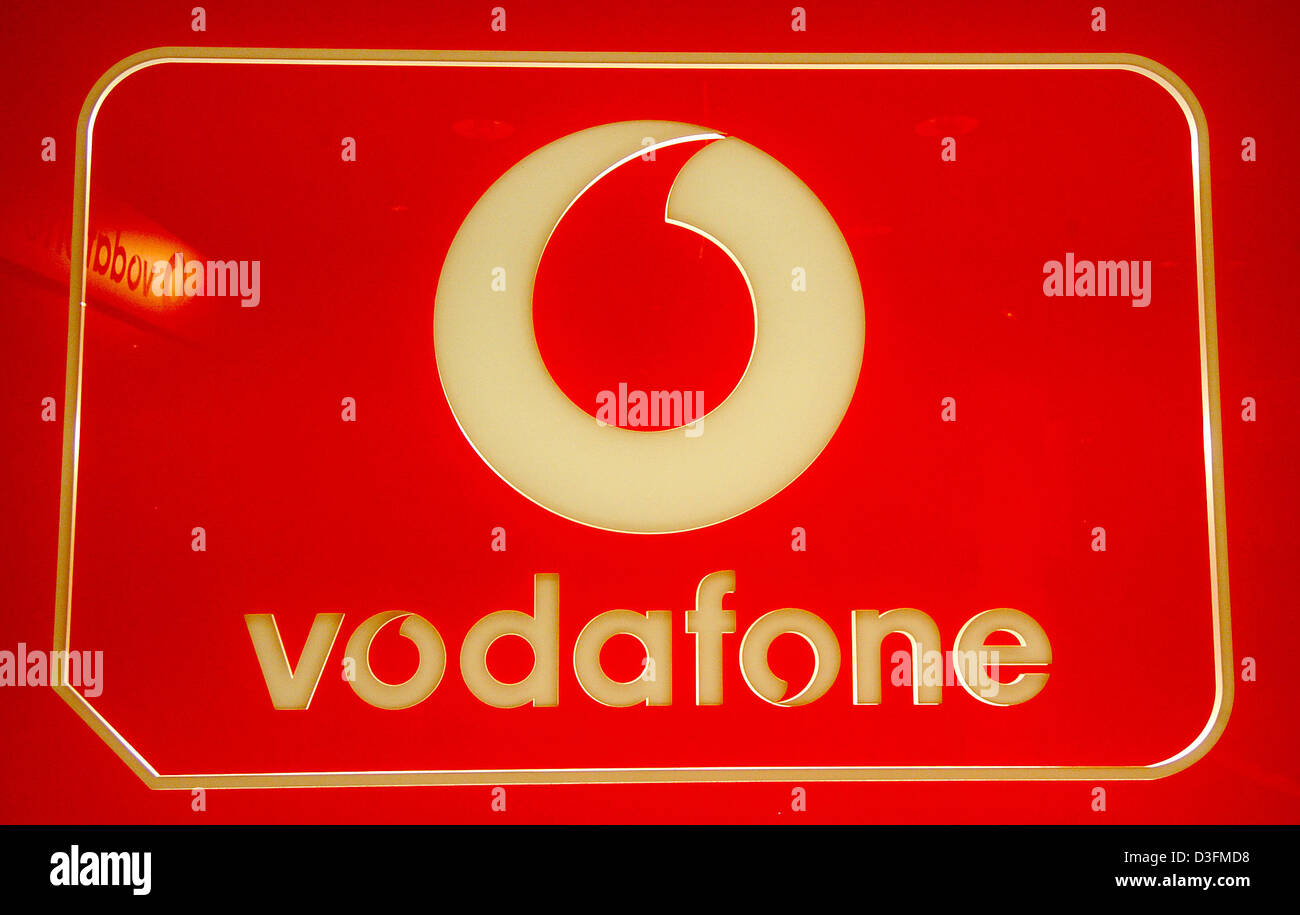 (dpa) A view of the neon logo of mobile network provider Vodafone at a store in Berlin, 5