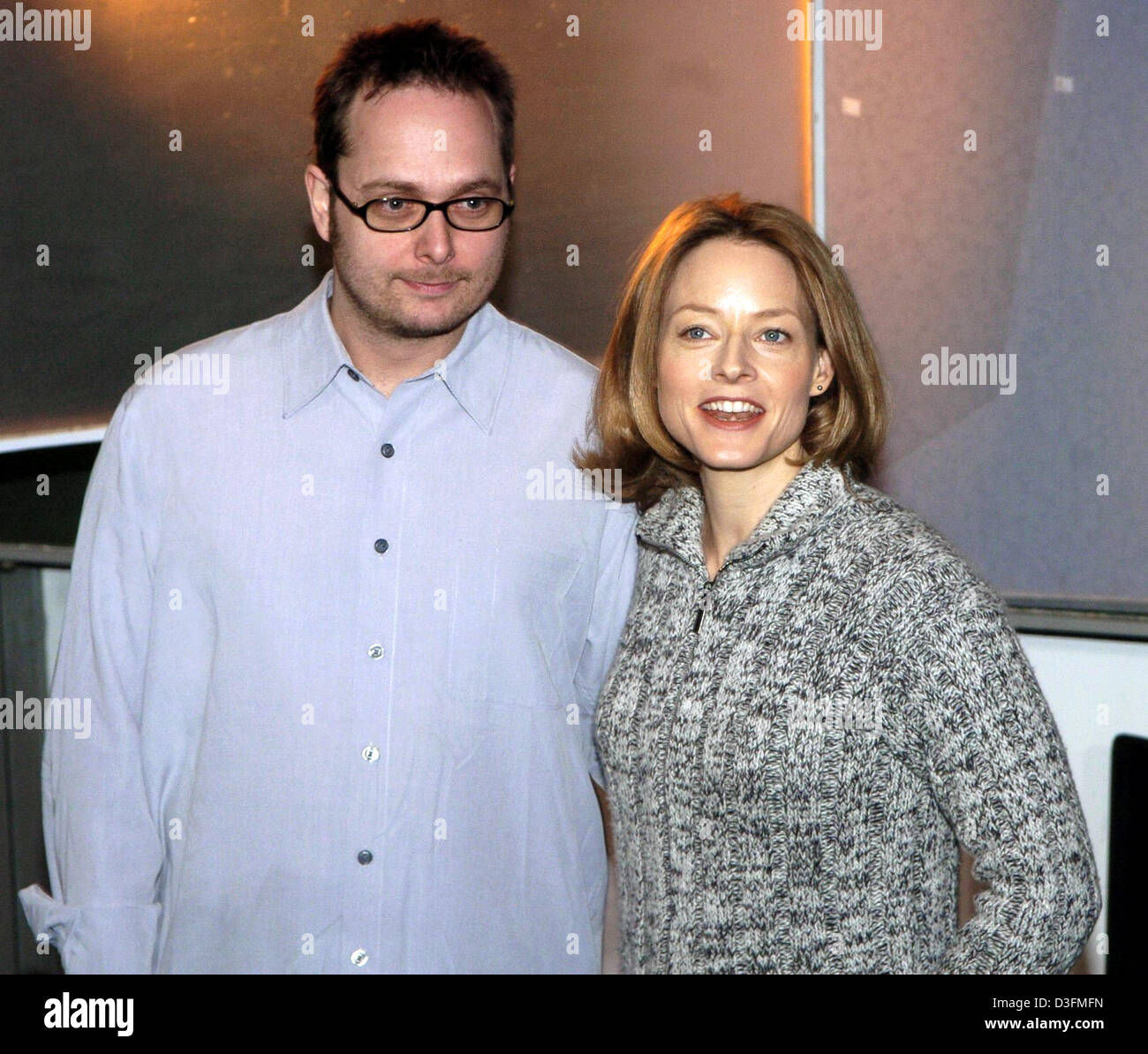(dpa) - US actress Jodie Foster poses with film director Robert Schwentke during a photocall in Berlin, on Wednesday, 8 December 2004. Their new film 'Flightplan' is currently being shot in Berlin. Stock Photo