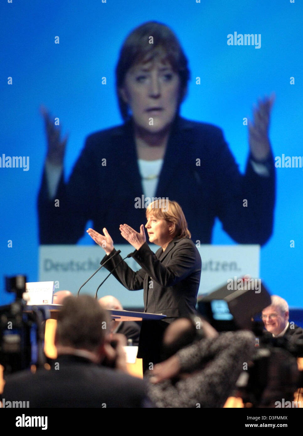 (dpa) - Angela Merkel, Leader of the German Christian Democratic Union (CDU), gives a speech during the CDU's 18th party congress in Duesseldorf, Germany, 6 December 2004. The party congress takes place under the motto 'Deutschlands Chancen nutzen' (to use Germany's chances). Stock Photo