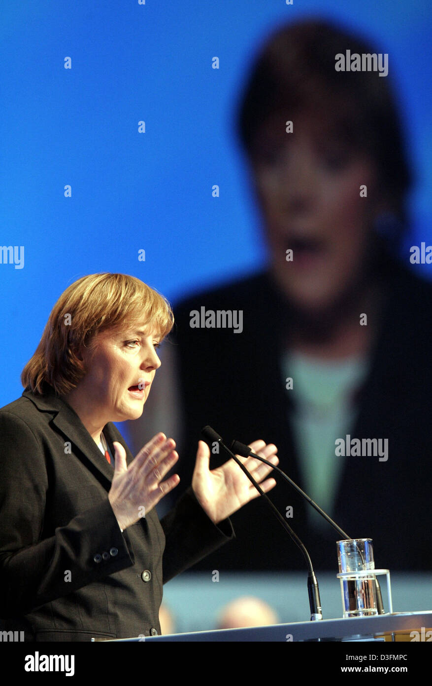 (dpa) - Angela Merkel, Leader of the German Christian Democratic Union (CDU), gives a speech during the CDU's 18th party congress in Duesseldorf, Germany, 6 December 2004. The party congress takes place under the motto 'Deutschlands Chancen nutzen' (to use Germany's chances). Stock Photo