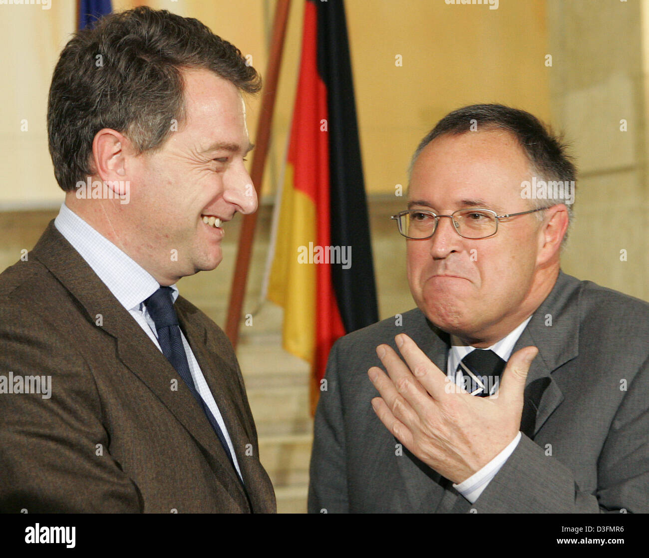 (dpa) - German Finance Minister Hans Eichel (R) receives his French counterpart, newly appointed French Economy and Finance Minister Herve Gaymard (L) at the ministry for finance in Berlin, Germany, 2 December 2004. Gaymard, who has been in office since 29 November 2004, aims to ease the relationships with Germany which has become a bit tense under the helm of his predecessor Sarko Stock Photo